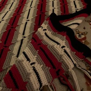 Red, white, black and grey hand crocheted blanket